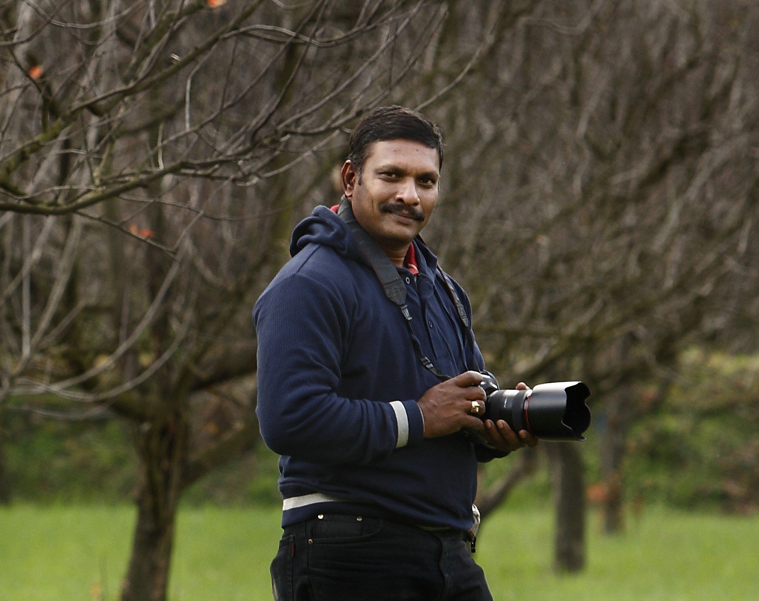 B. Sridhar Raju, founder of Praxis Studio, with a camera in the field